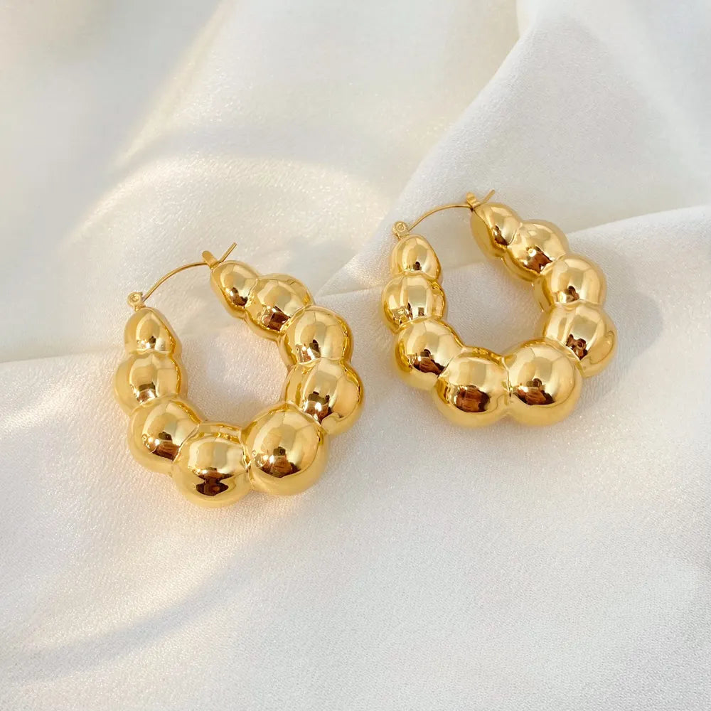 Mora Huggie Hoop Earrings