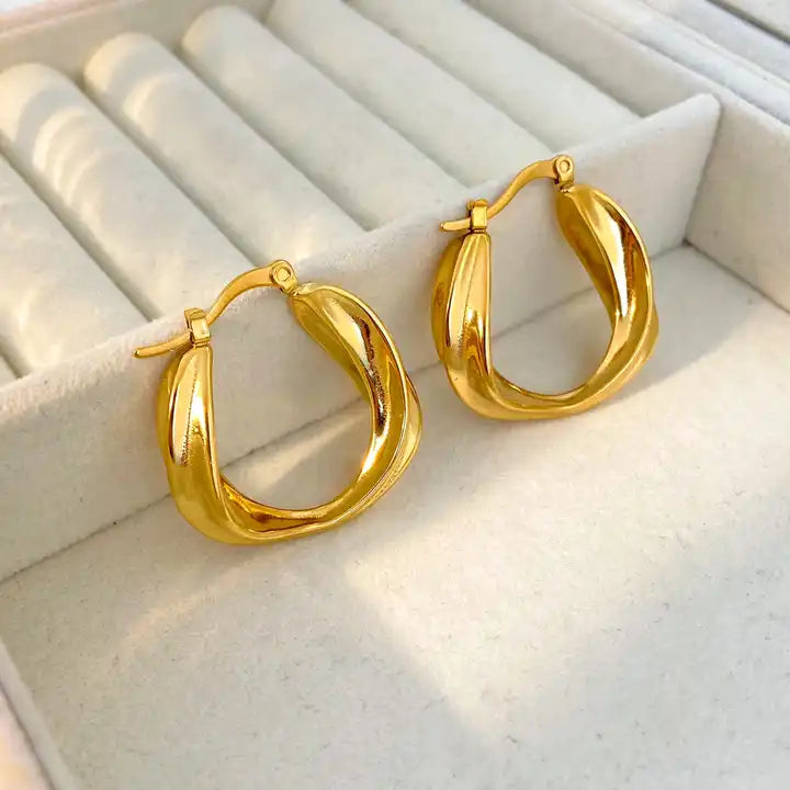 Thalia Twist Huggie Earrings